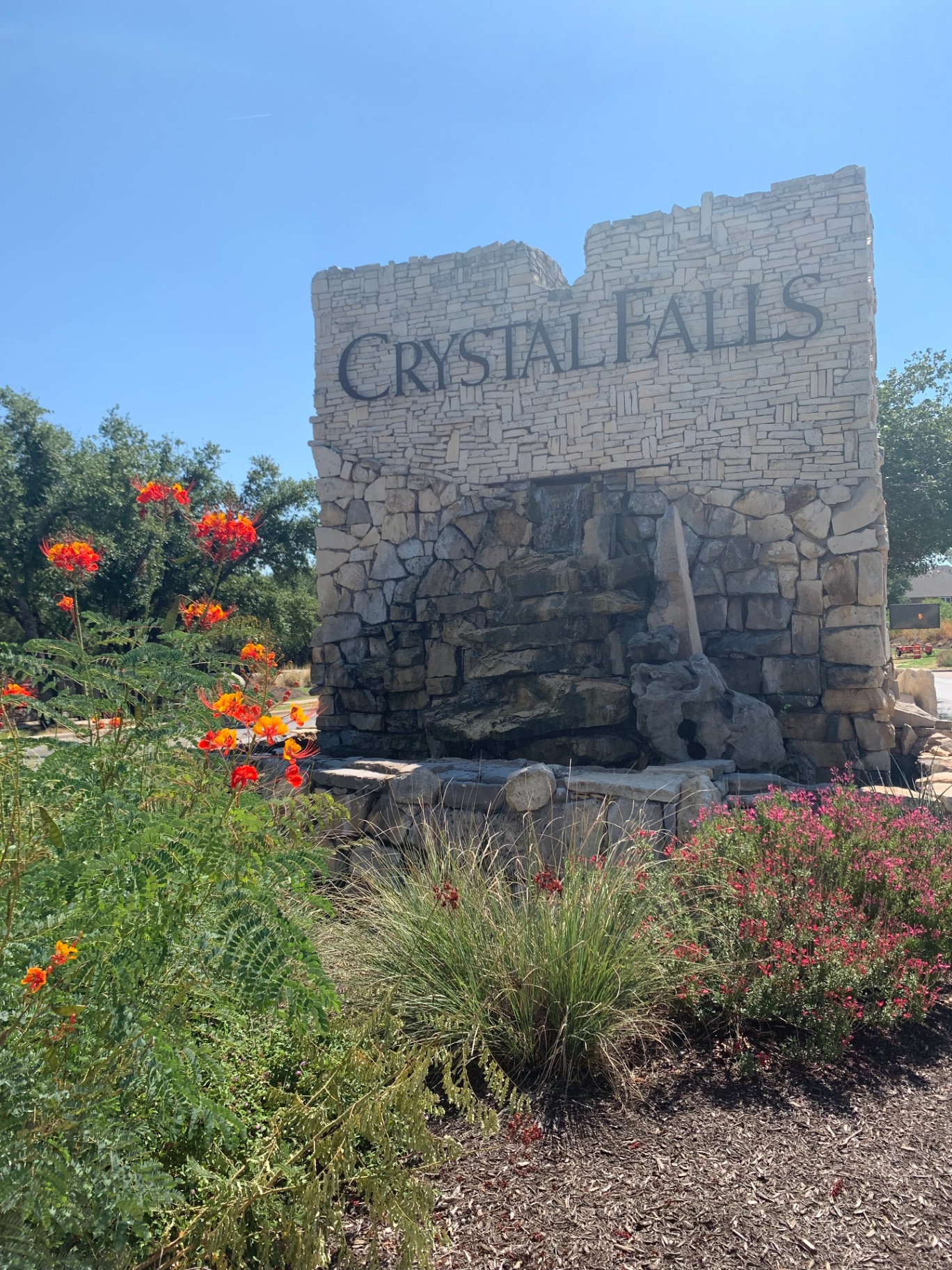 Crystal Falls entrance monument in Leander, Texas